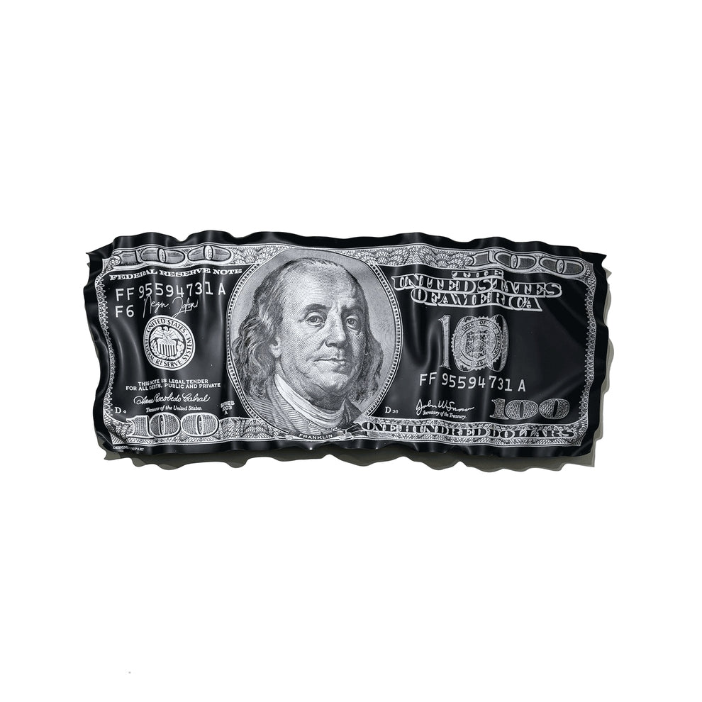 Black and silver dollar bill