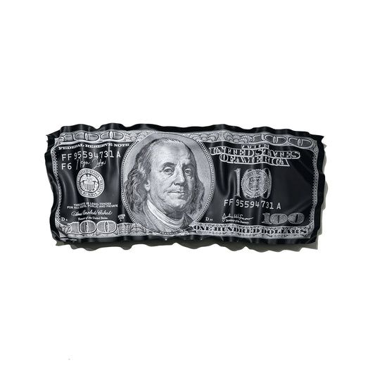 Black and silver dollar bill